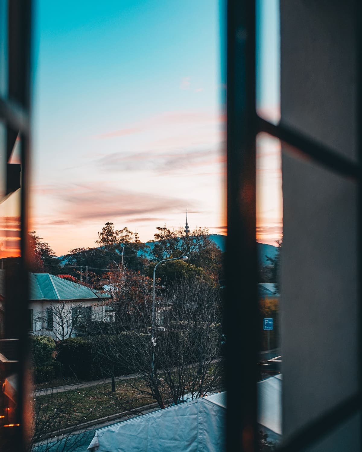 Sunset over the Ainslie rooftops seen from The Inn's window